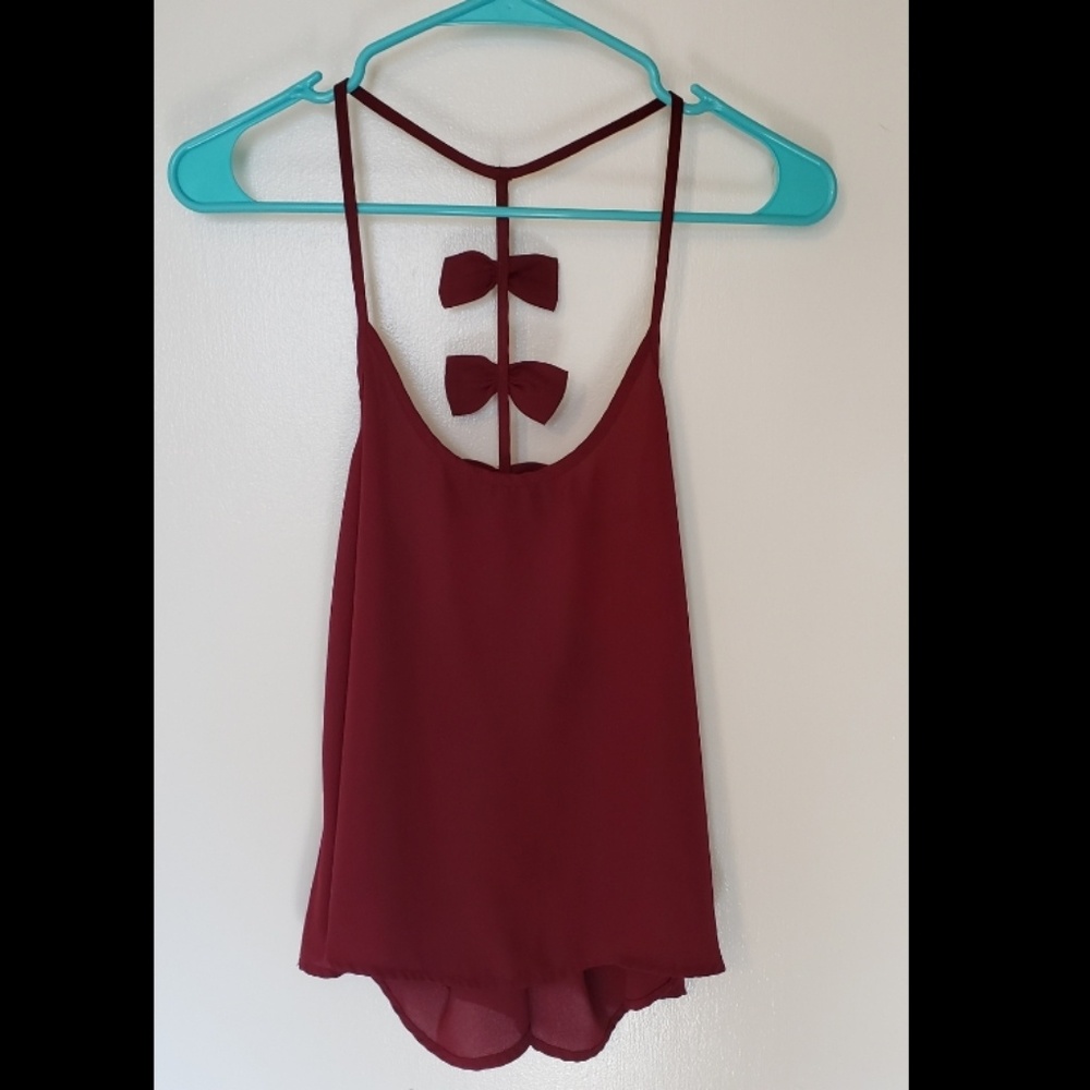 Deep red tank with bows on back